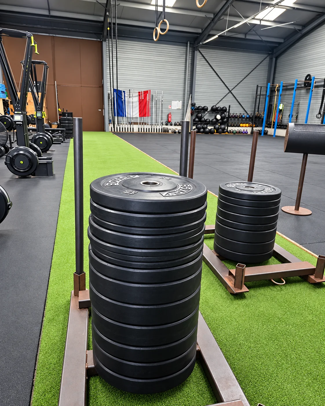Sleds et disques de charges sur la piste de poussée de la box